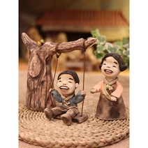 토우인형 그네 타기